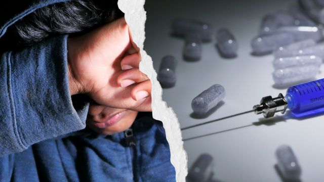 Person with alcohol and drugs on a table